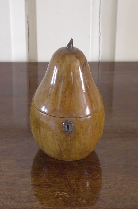 A fruitwood pear tea caddy