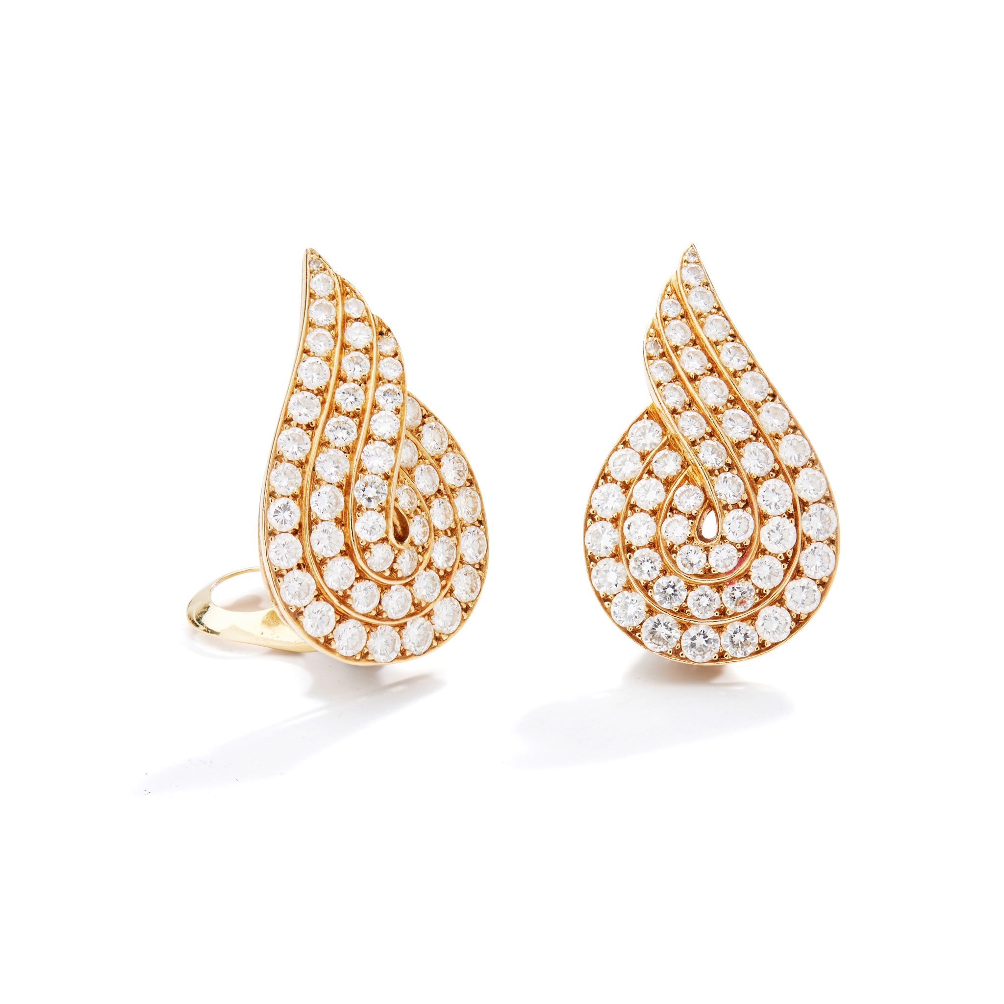 A pair of diamond earclips, by Van Cleef & Arpels