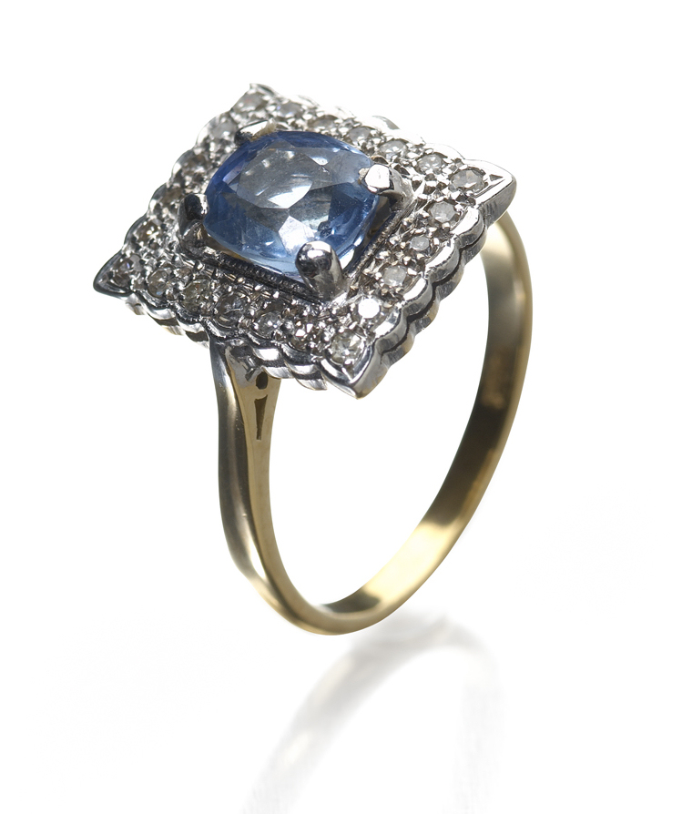 An 18ct gold mounted sapphire and diamond set ring,