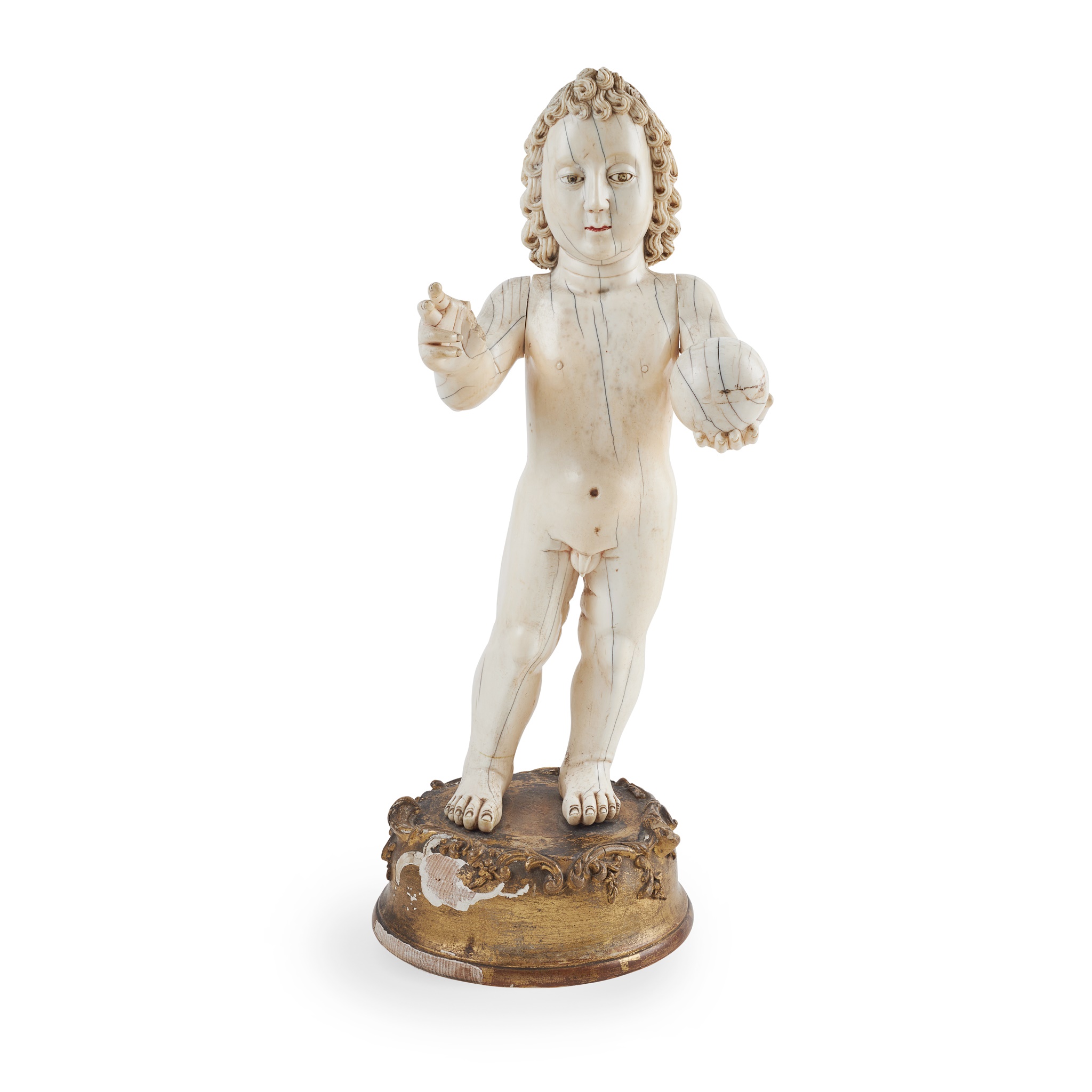 LARGE INDO-PORTUGUESE CARVED IVORY FIGURE OF THE INFANT CHRIST AS SALVATOR MUNDI, THE SAVIOUR OF THE WORLD