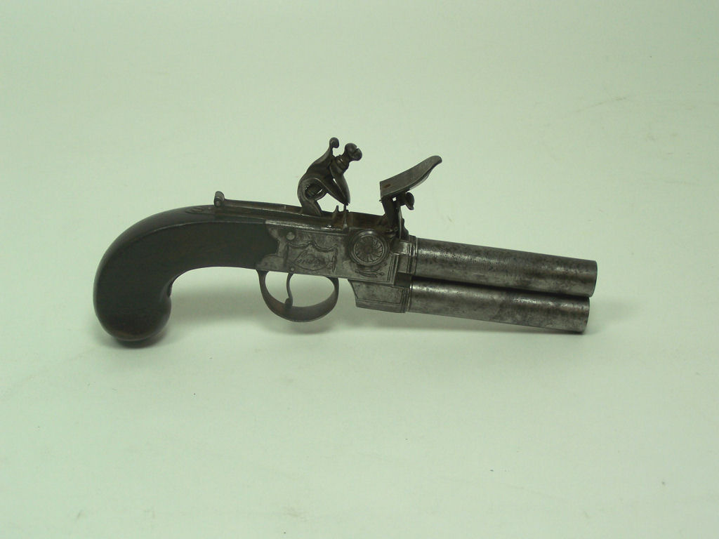 A mid 18th century flintlock boxlock double barrelled tap action pocket pistol
