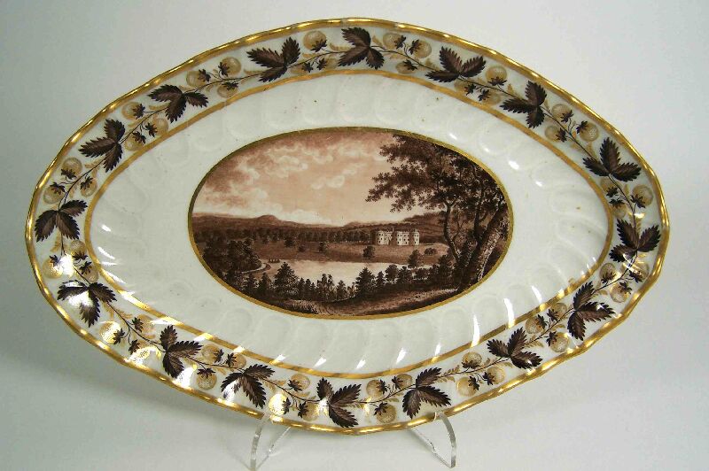 A Flight & Barr scalloped oval topographical fruit dish depicting Blenheim, Oxfordshire, circa 1795