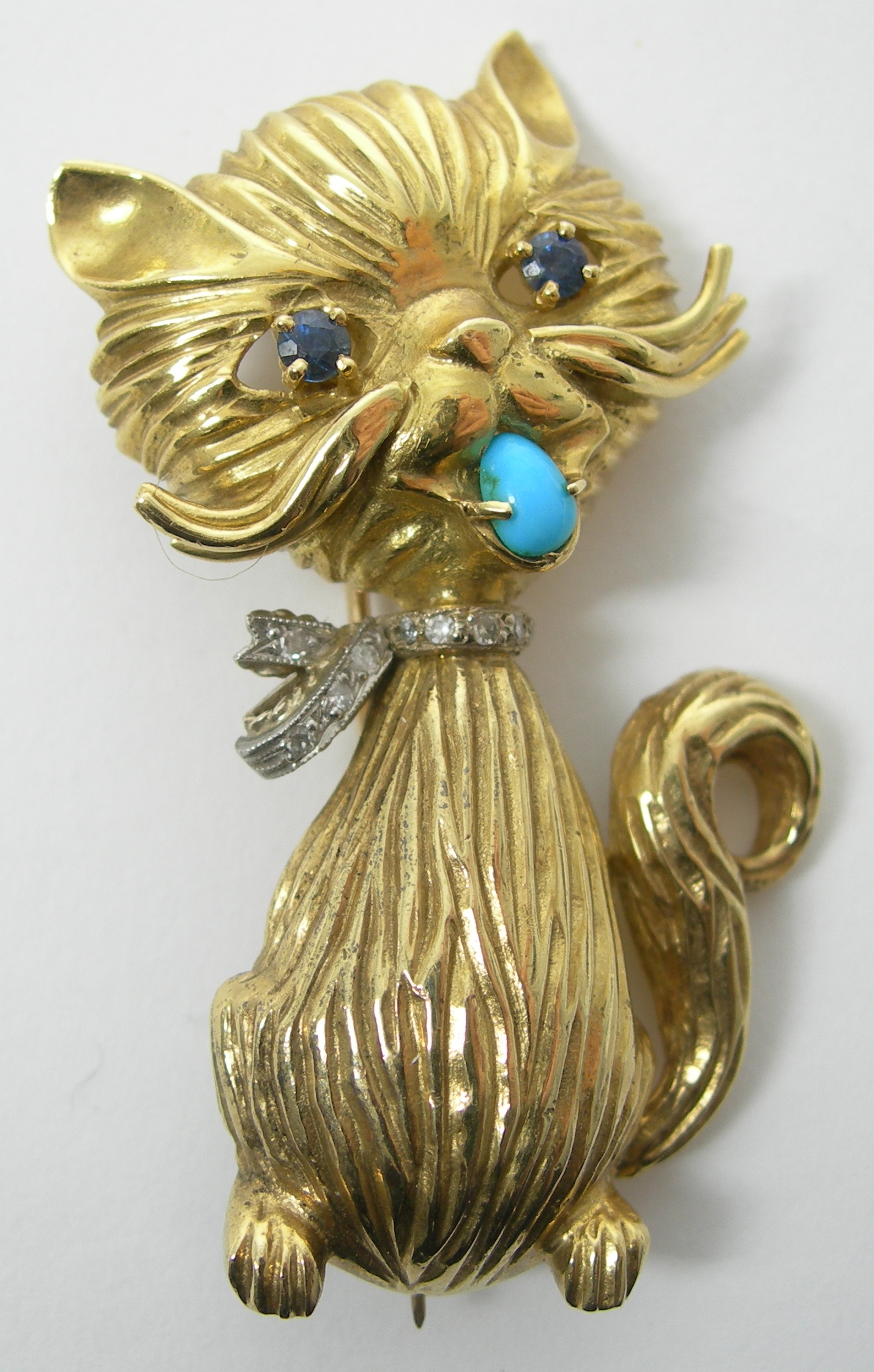 A 1960's 18ct gold mounted multi-gem set novelty brooch,