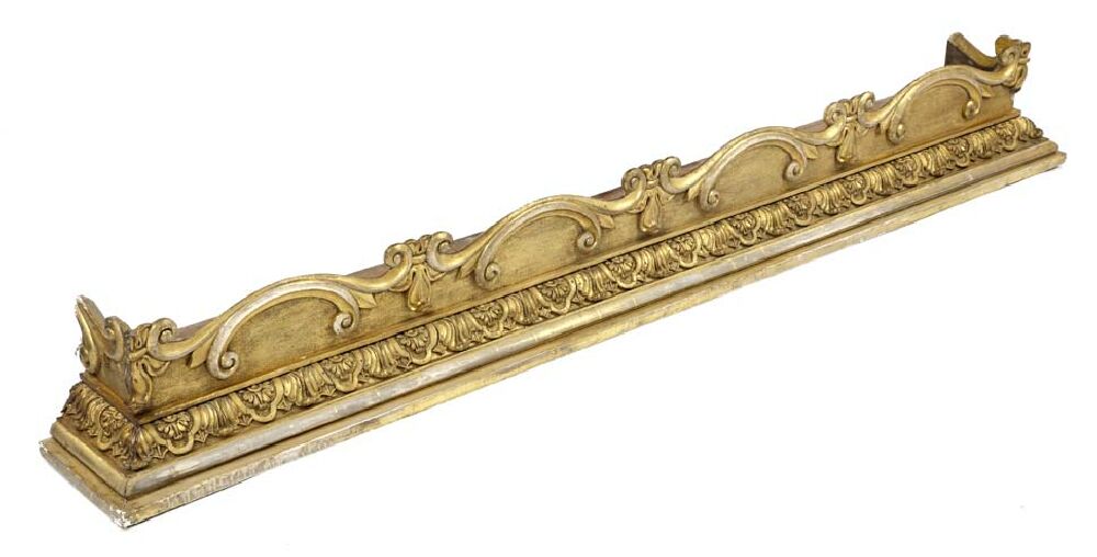 A large late 19th century carved giltwood pelmet