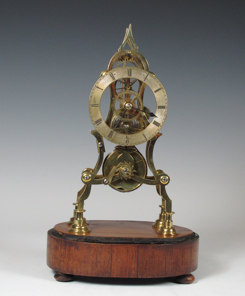 A brass skeleton clock
