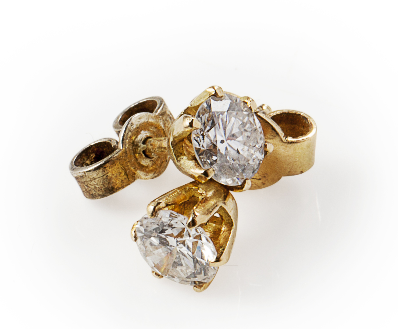 A pair of diamond set ear studs