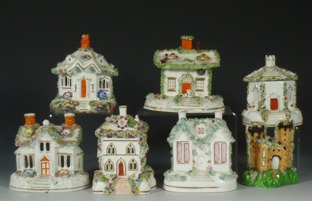 A group of seven mid 19th century Staffordshire pastille burners
