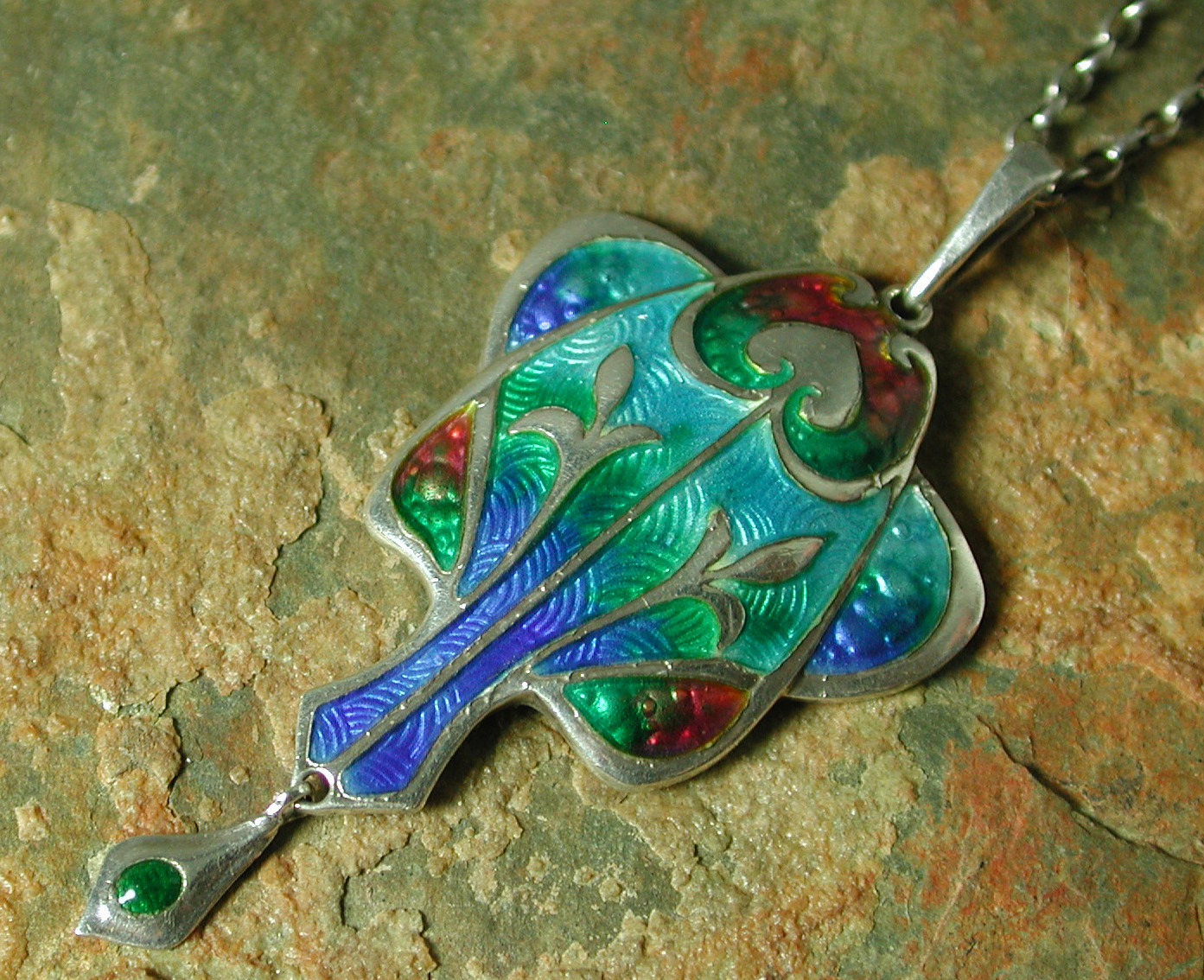 A Schaverin and Eastmead Art Nouveau silver and enamel pendant