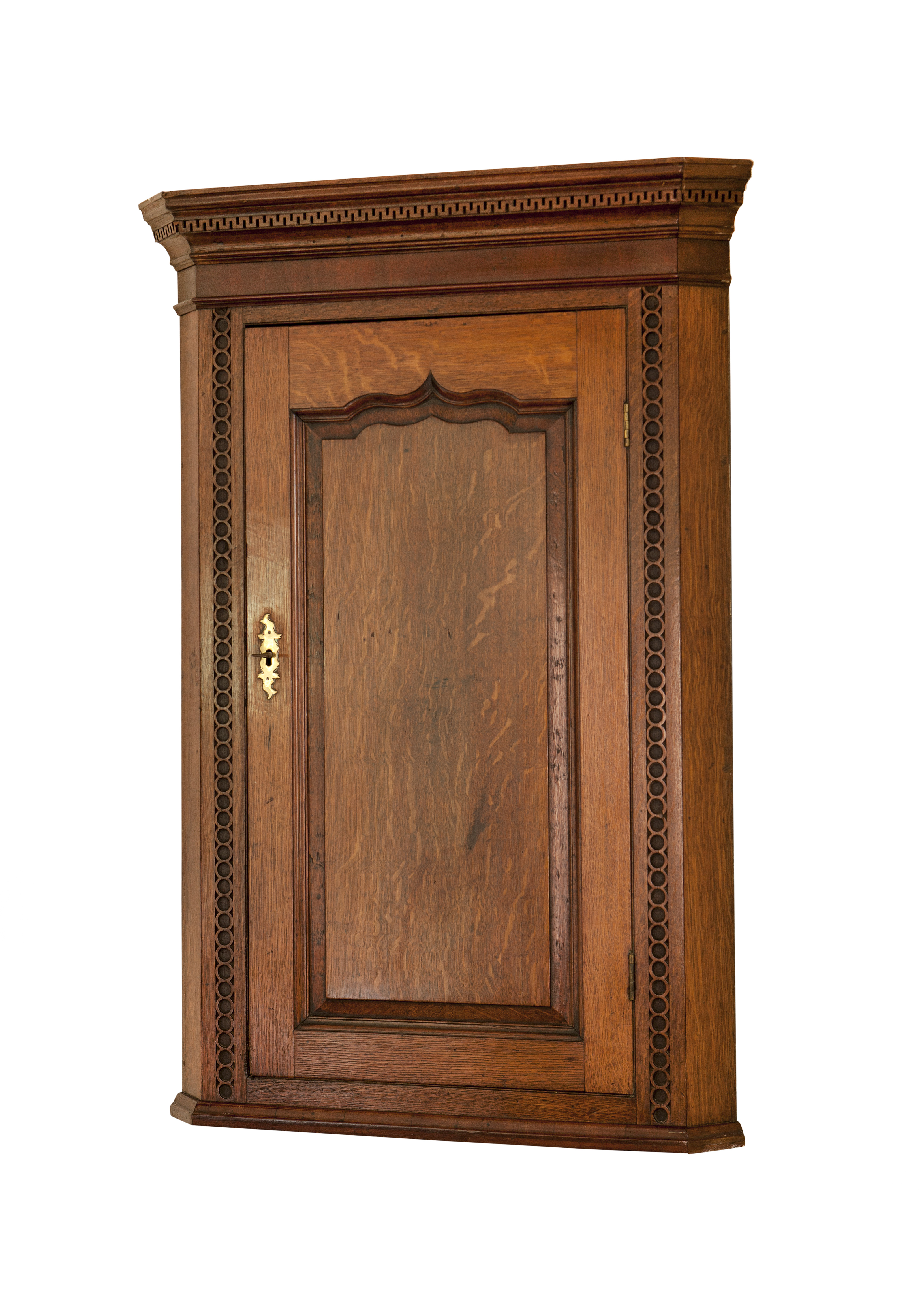 GEORGE III CARVED OAK HANGING CORNER CABINET