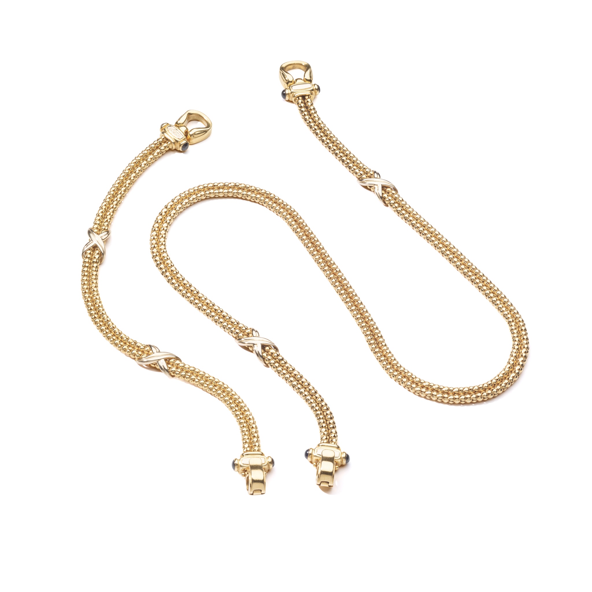 A fancy-link necklace and bracelet