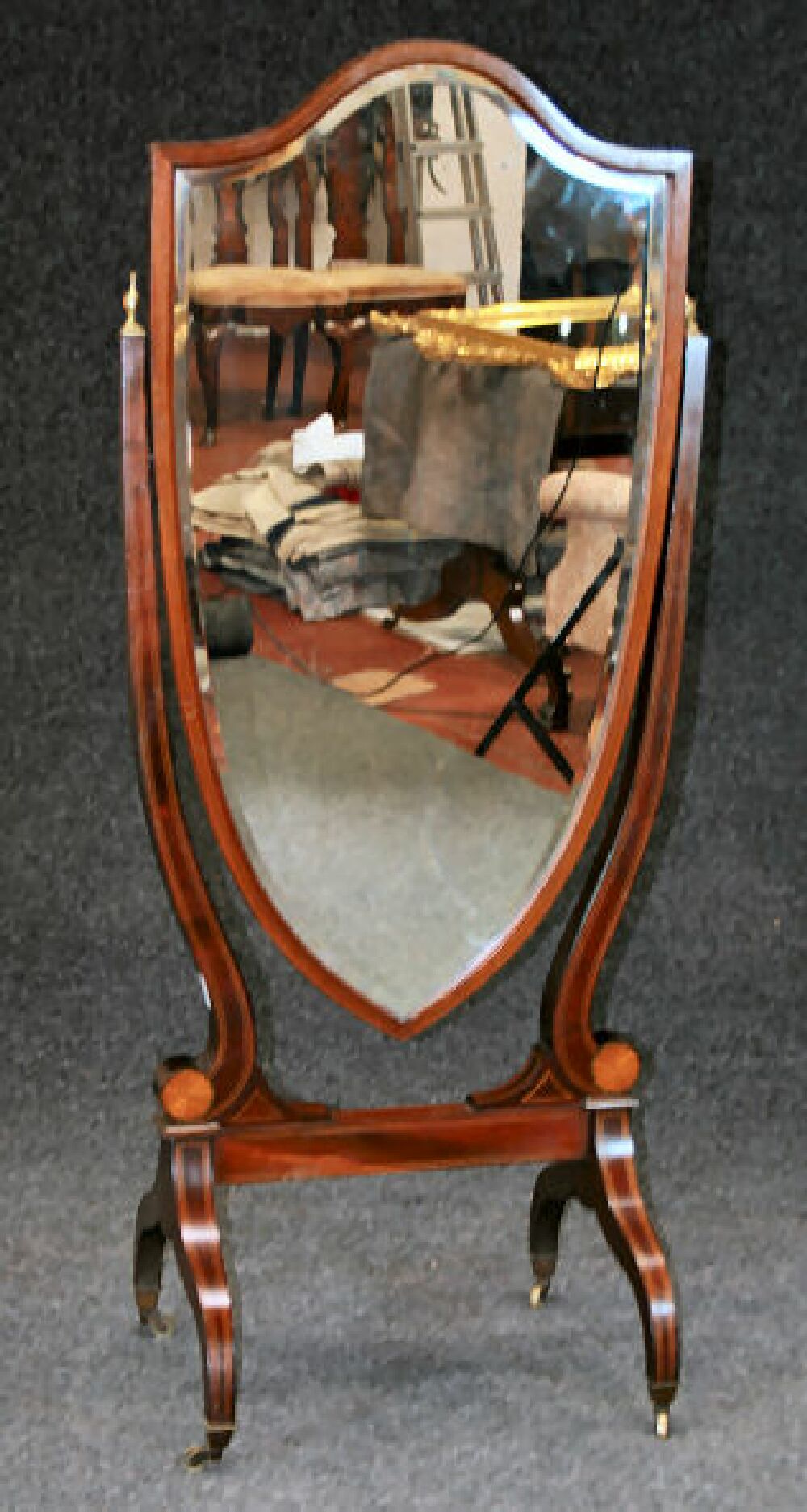 An Edwardian period mahogany and inlaid cheval glass