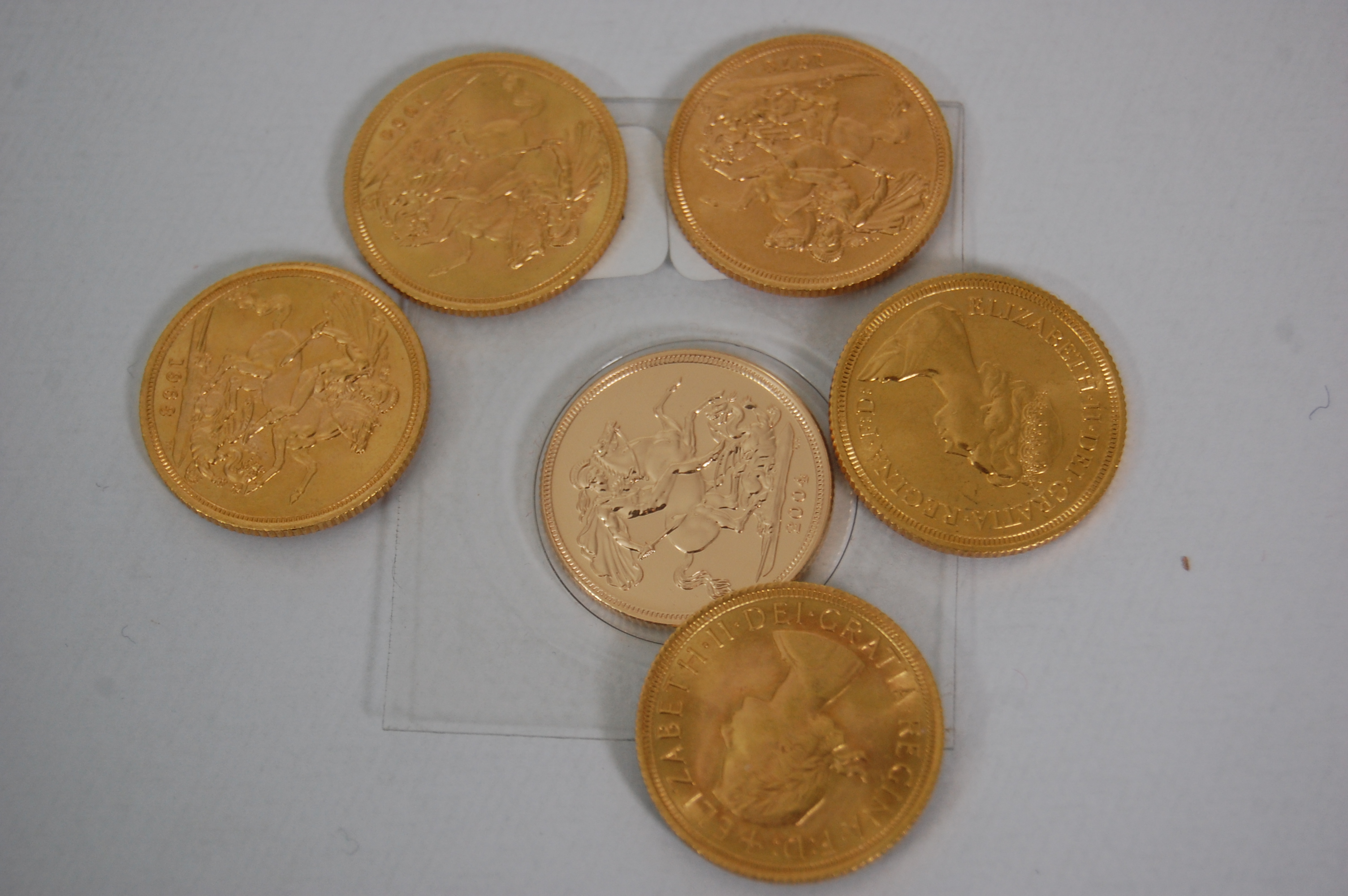 A collection of six Elizabeth II sovereigns