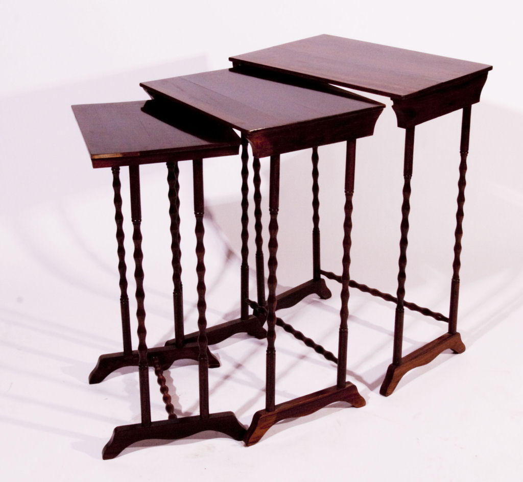 A late 19th century rosewood nest of tables