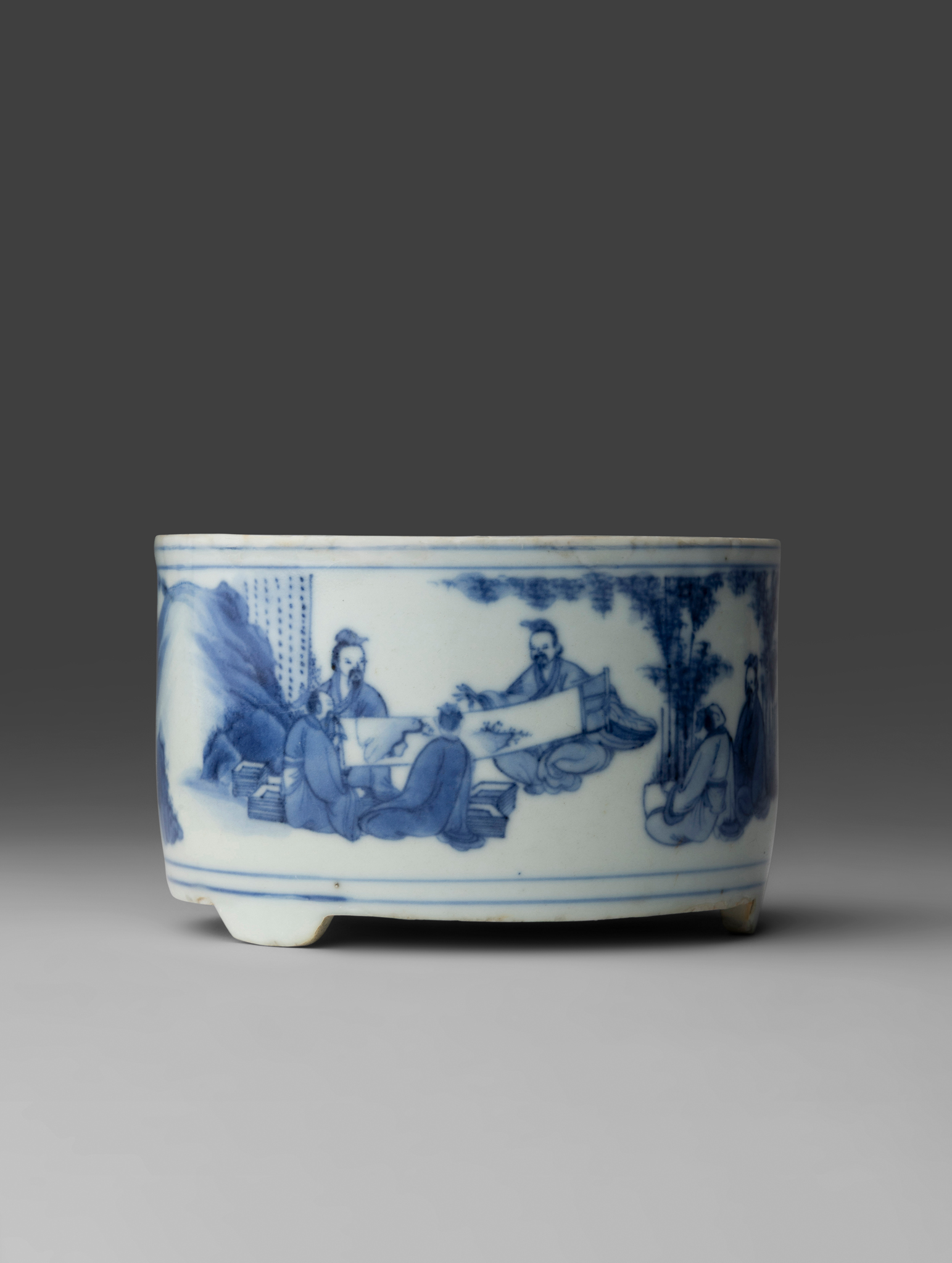 RARE CHINESE BLUE AND WHITE 'SEVEN SAGES' TRIPOD INCENSE BURNER, TONGLU