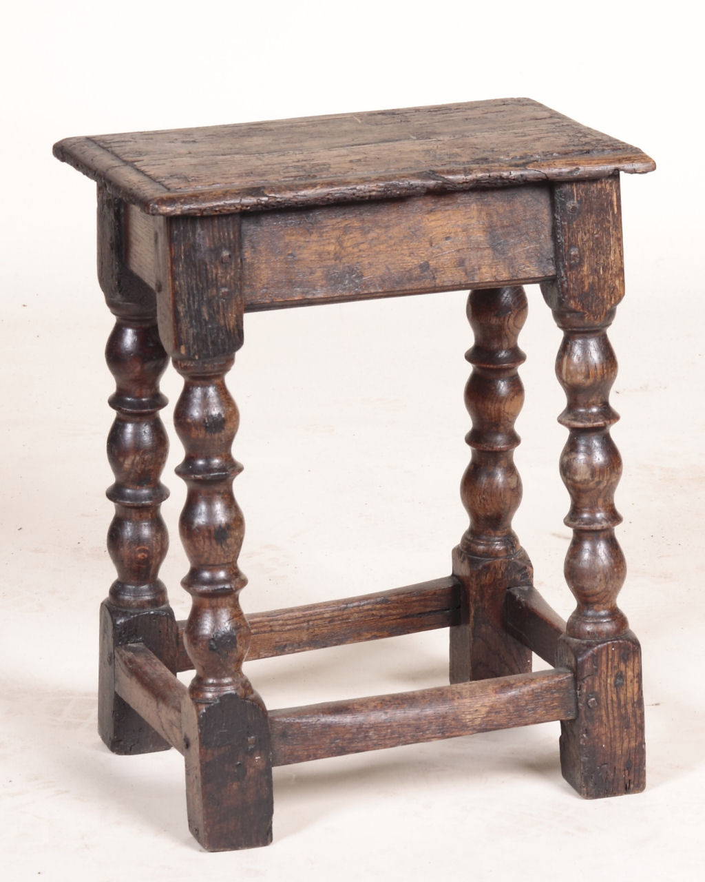 A 17th century oak joint stool