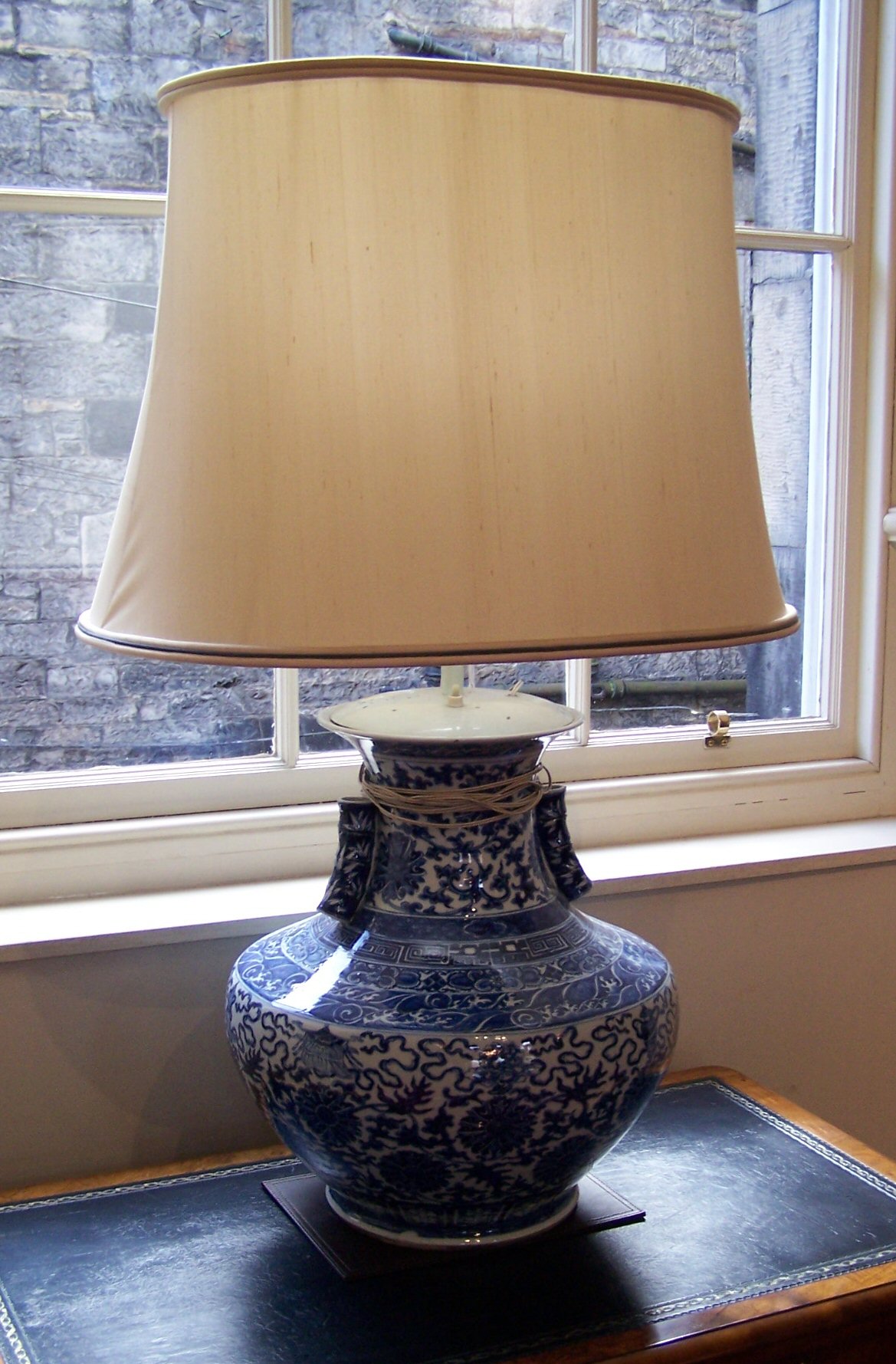 A pair of 20th century Chinese blue painted lamps