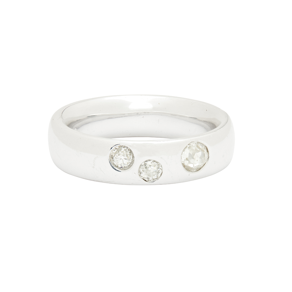 A modern three stone diamond ring