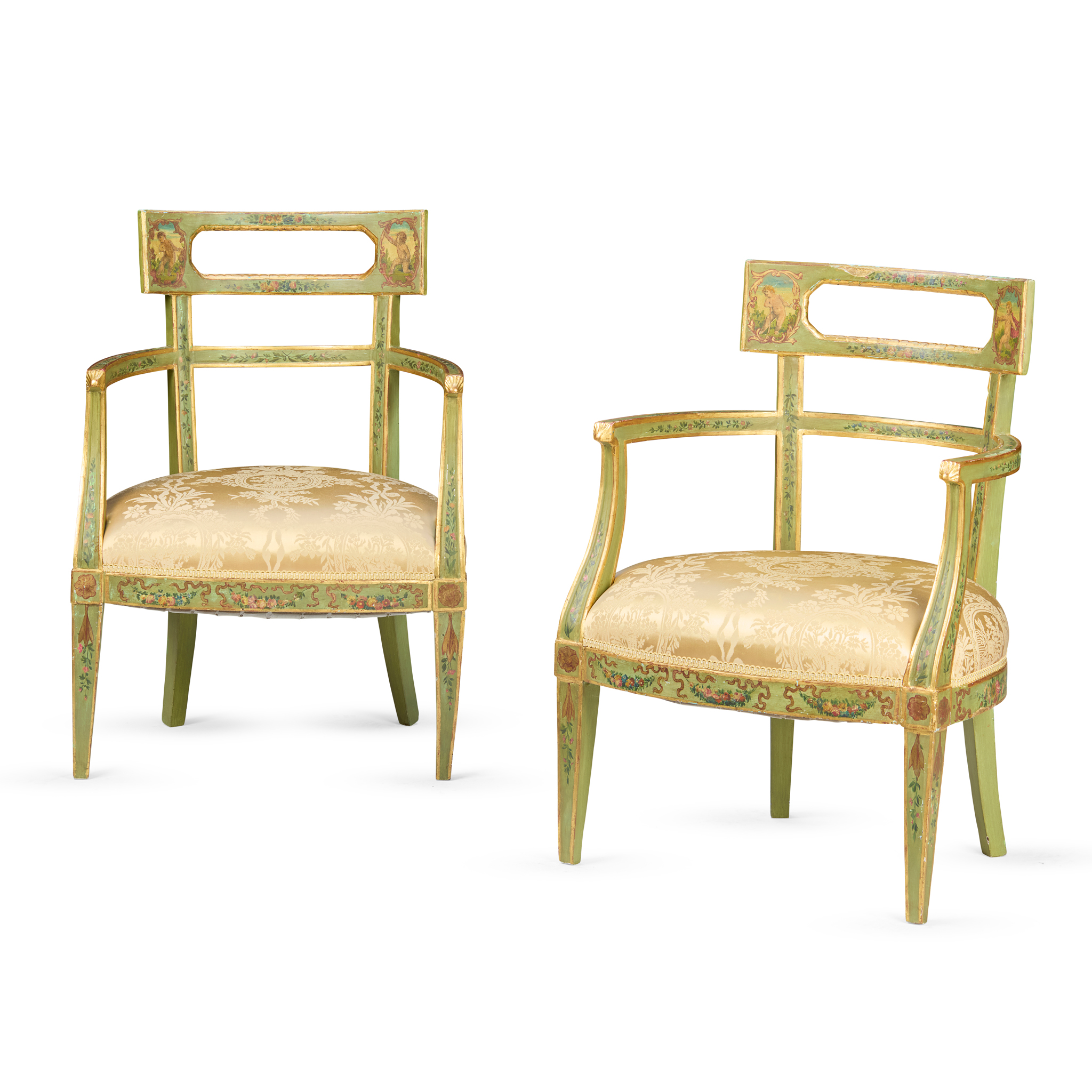 PAIR OF CONTINENTAL PAINTED AND PARCEL GILT ARMCHAIRS