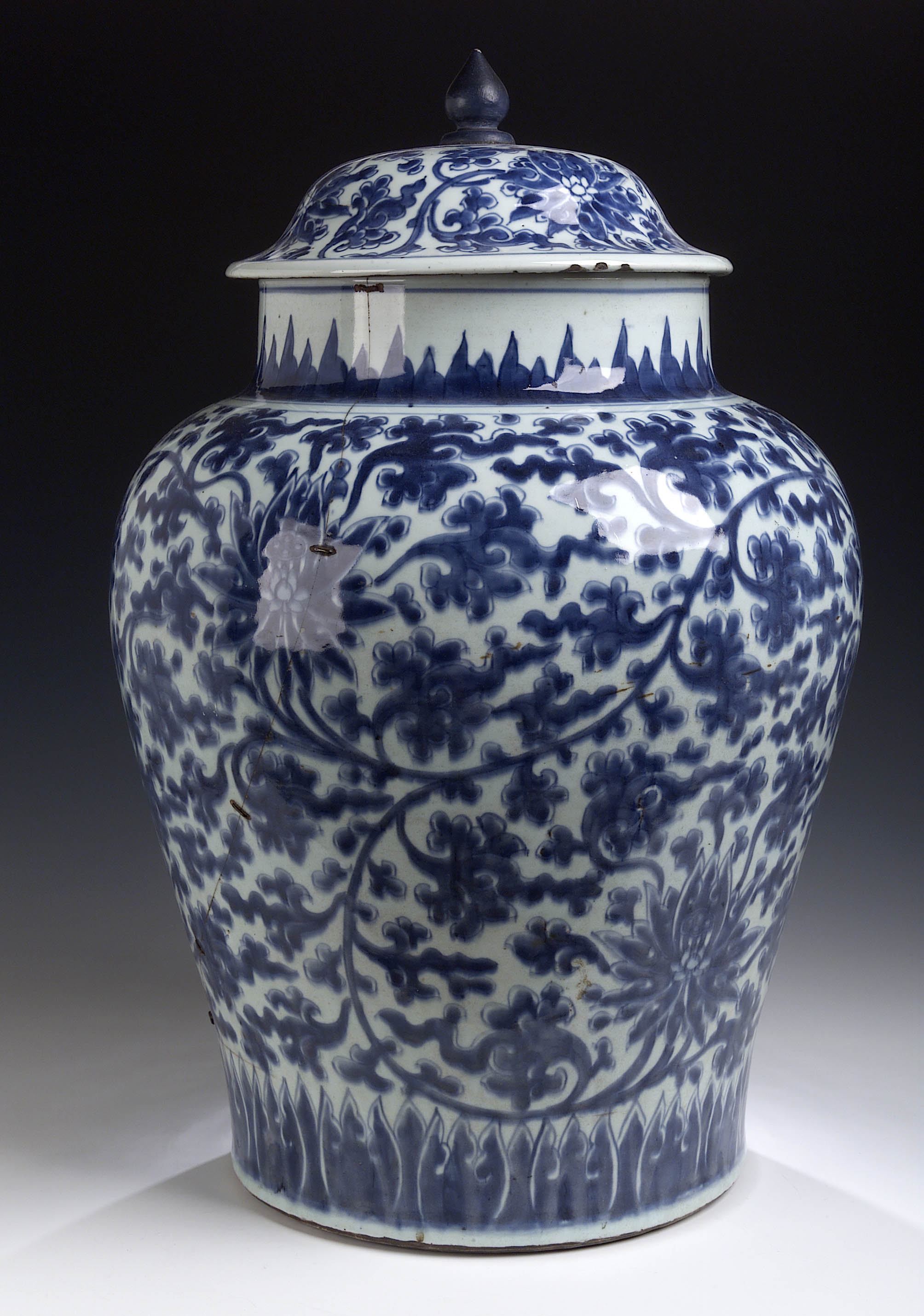A large 17th century Chinese blue painted baluster vase and cover