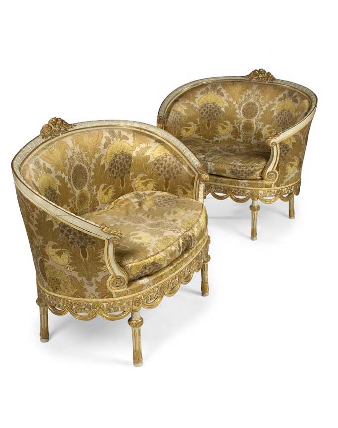 A pair of late 19th century giltwood and overpainted settees
