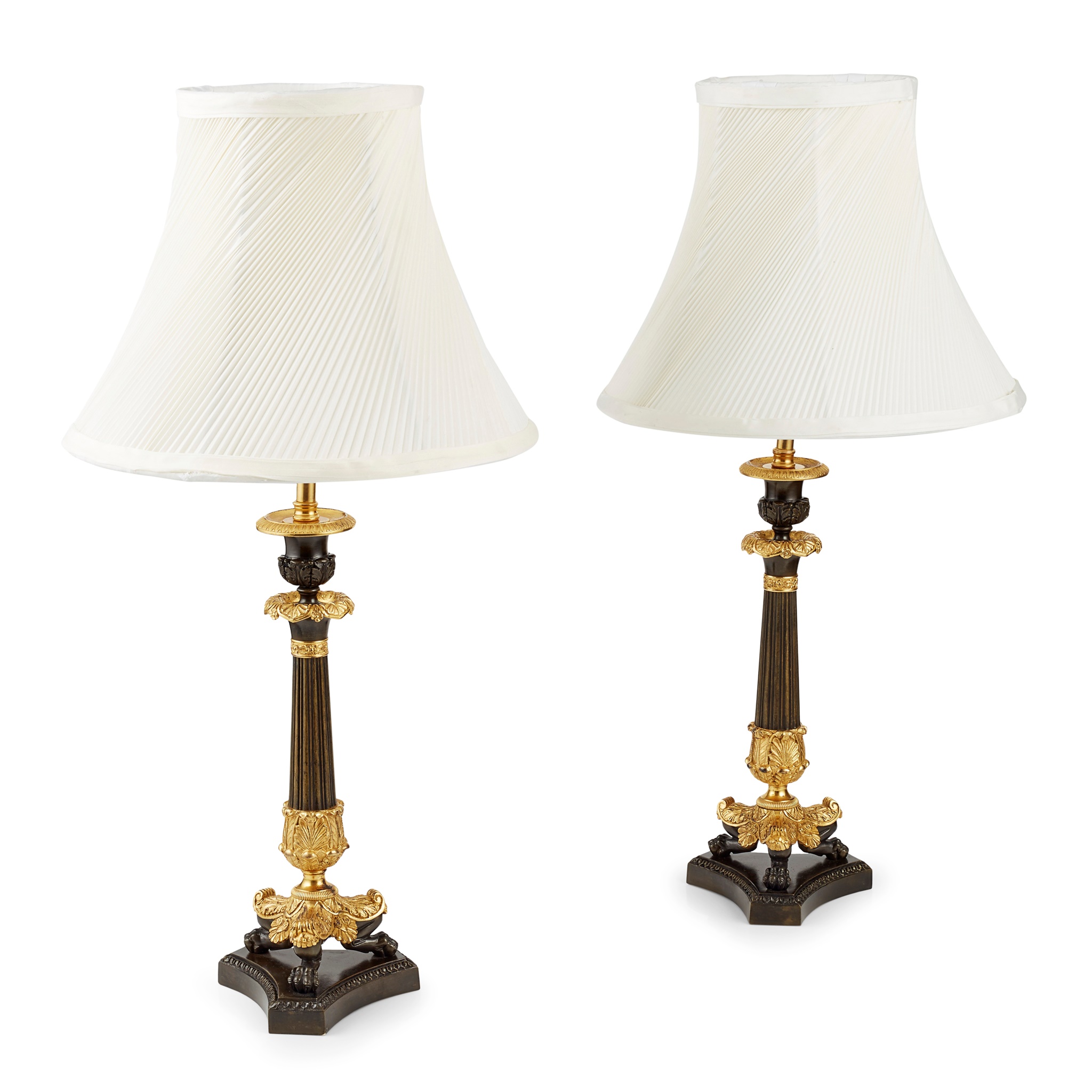 PAIR OF REGENCY GILT AND PATINATED BRONZE LAMPS