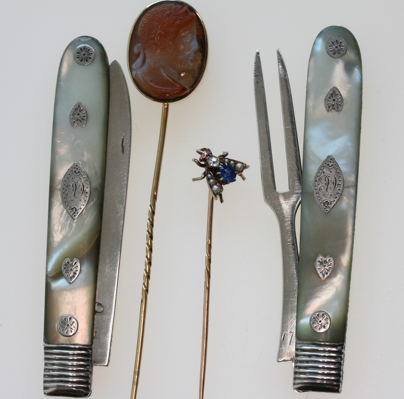 Two cased Victorian tie pins