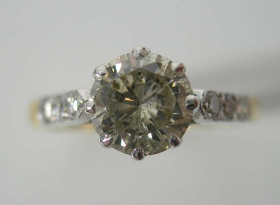 An 18ct gold mounted diamond ring,
