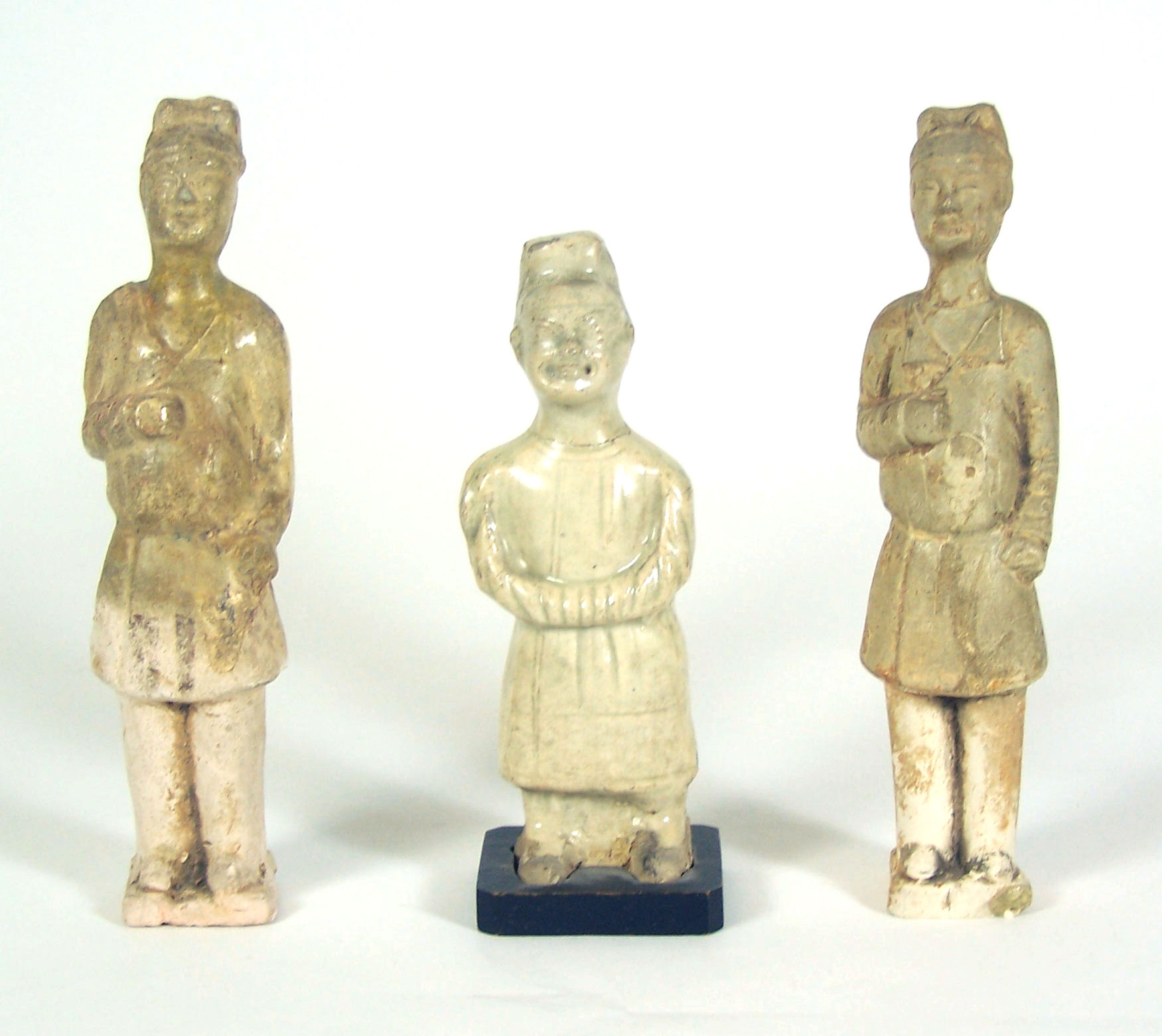 Two similar Chinese straw glazed earthenware figures, Sui/early Tang Dynasty