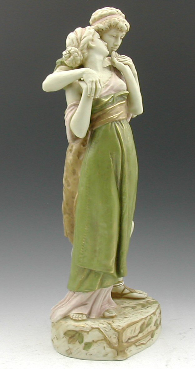 A Royal Dux figure group,