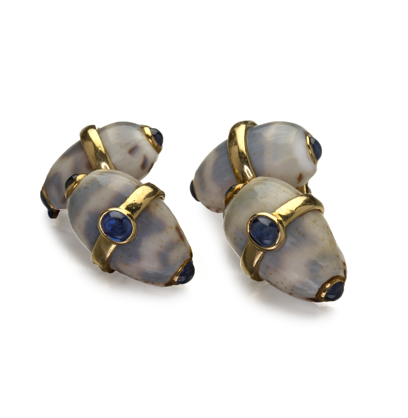 A pair of sapphire and shell cufflinks