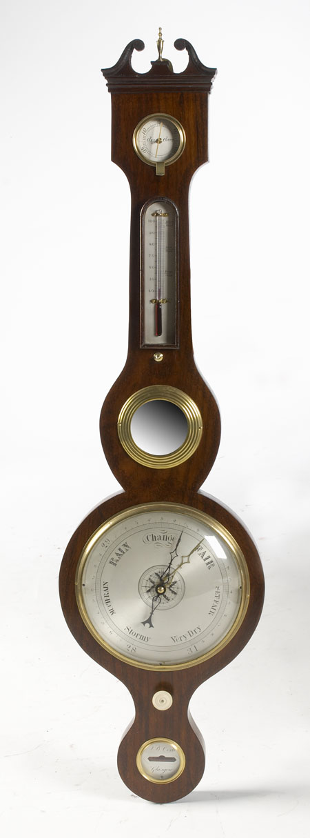 A George III period mahogany wheel barometer By S.Lilly , 66 Candlemaker Row, Edinburgh