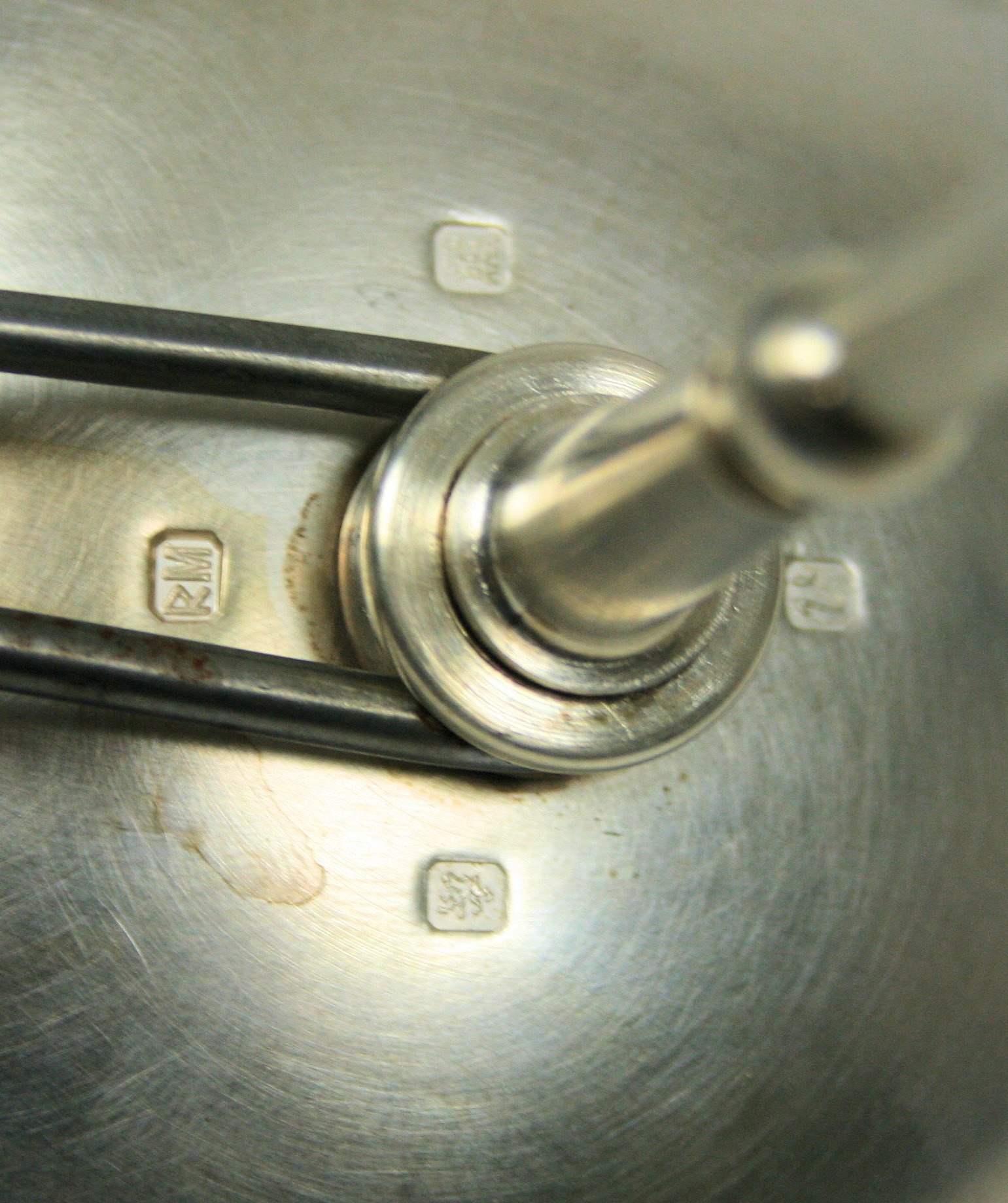 ROGER MILLAR - A pair of 'Living silver' candle holders