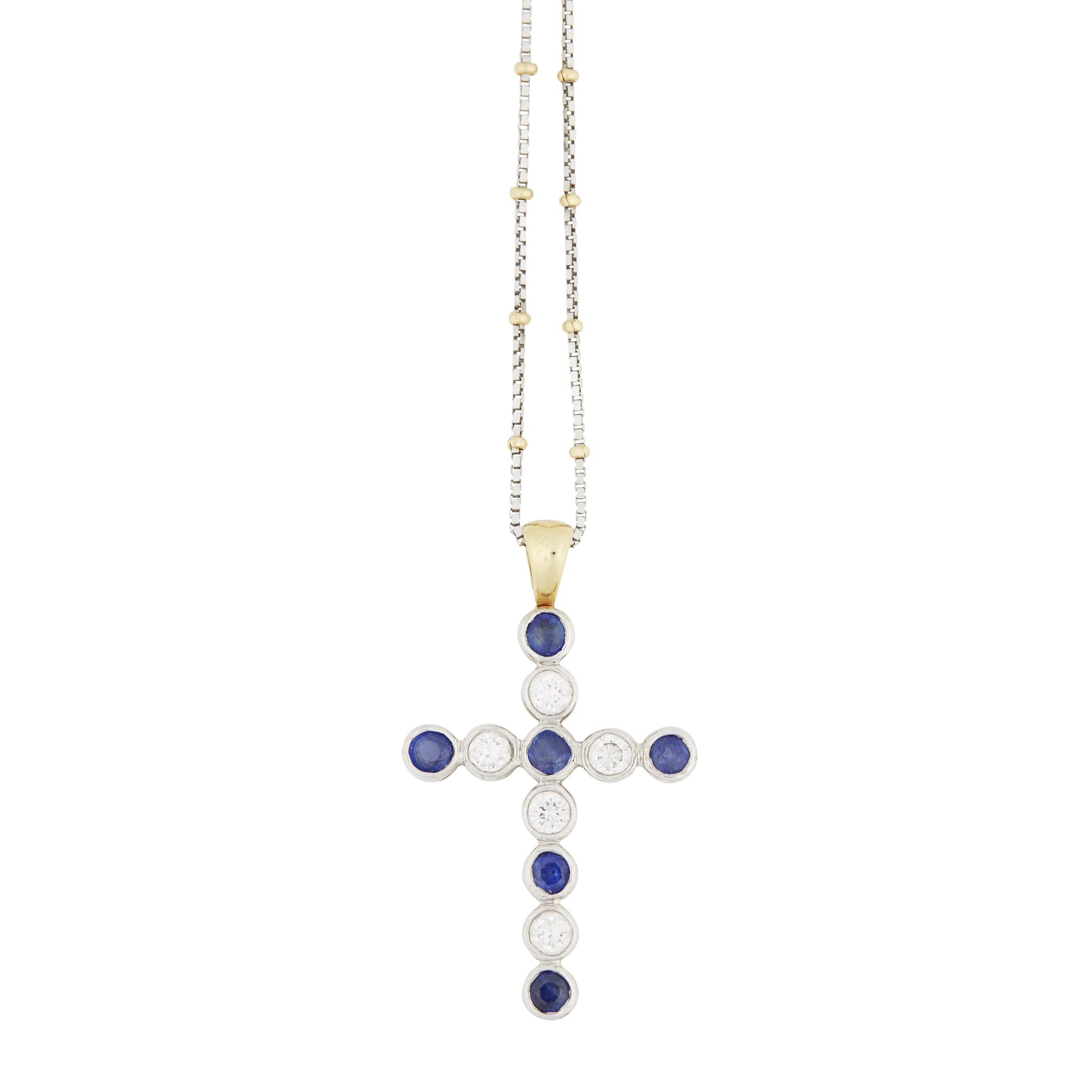 A 18ct gold sapphire and diamond set cross