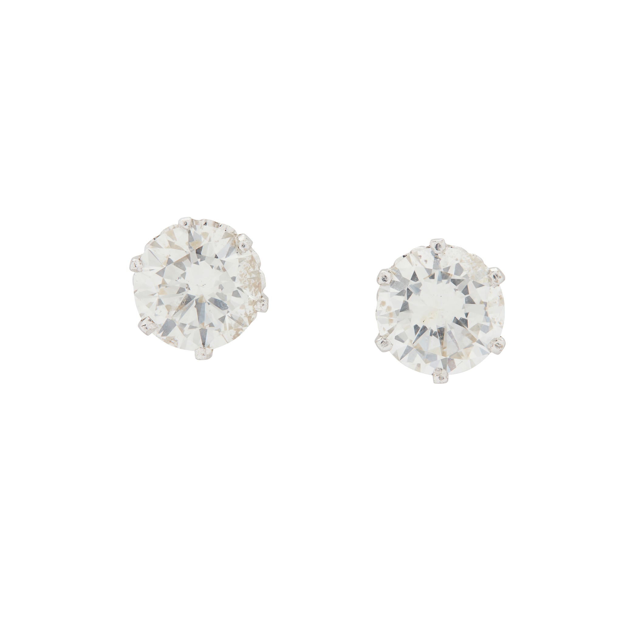 A pair of diamond stud earrings