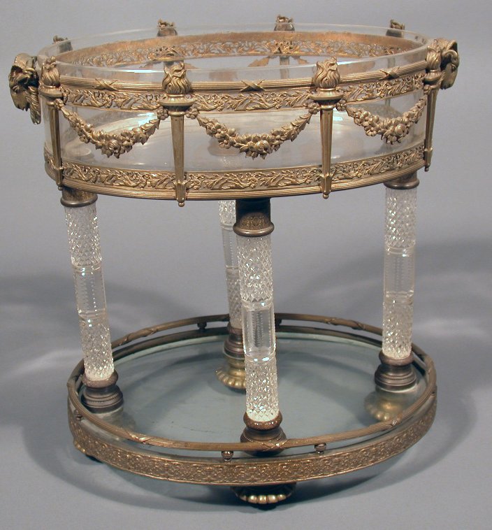 A cut glass and gilt metal two tier surtout de table