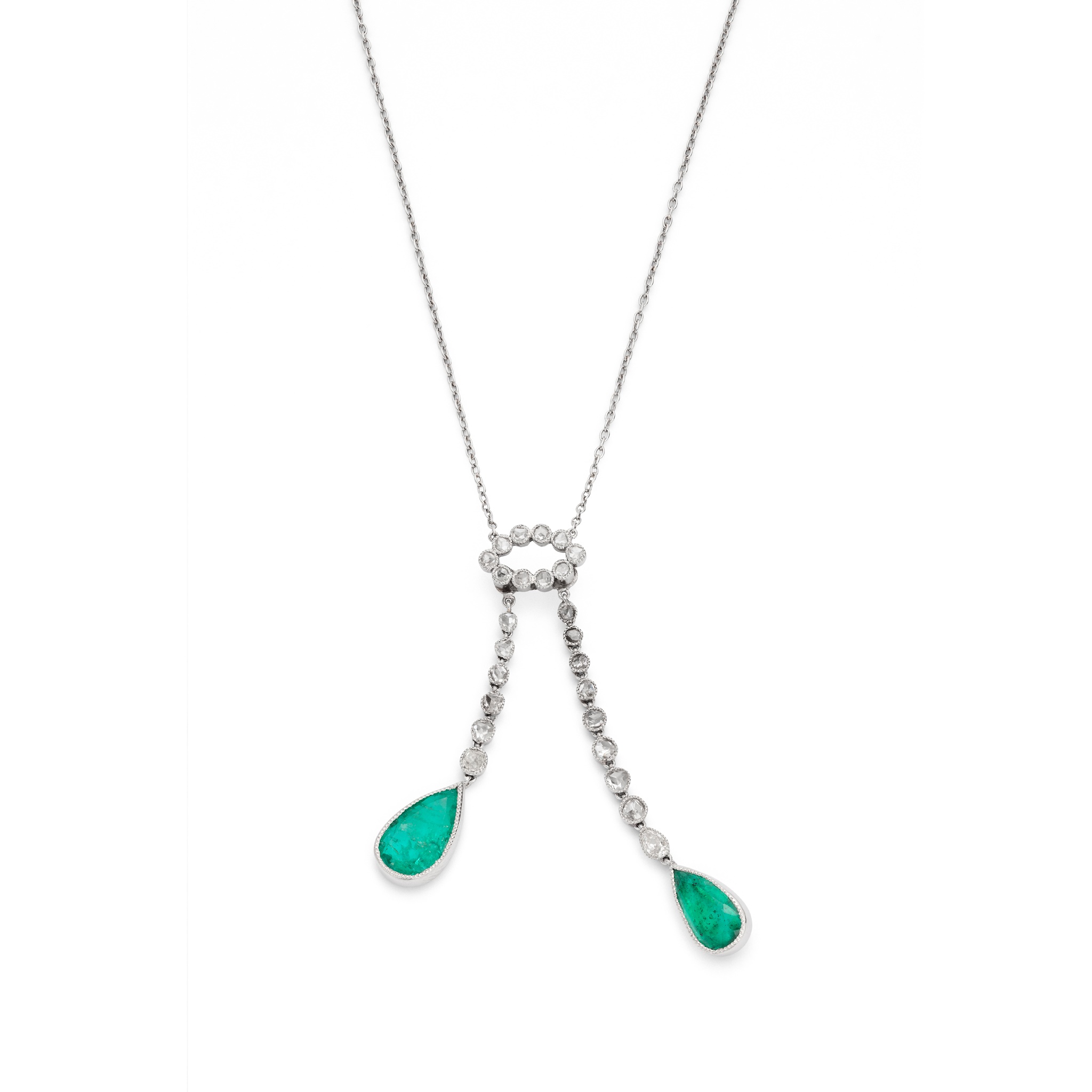 An early 20th century emerald and diamond lavallière necklace