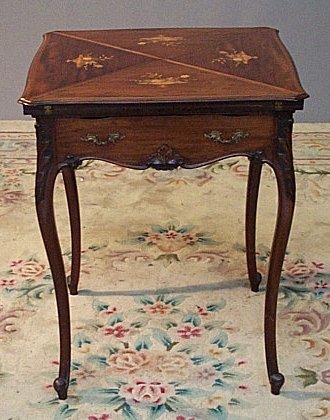 A Victorian mahogany envelope card table