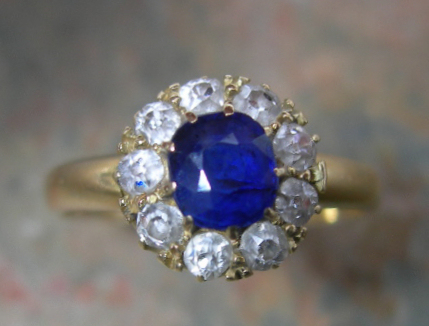 An Edwardian sapphire and diamond cluster ring,