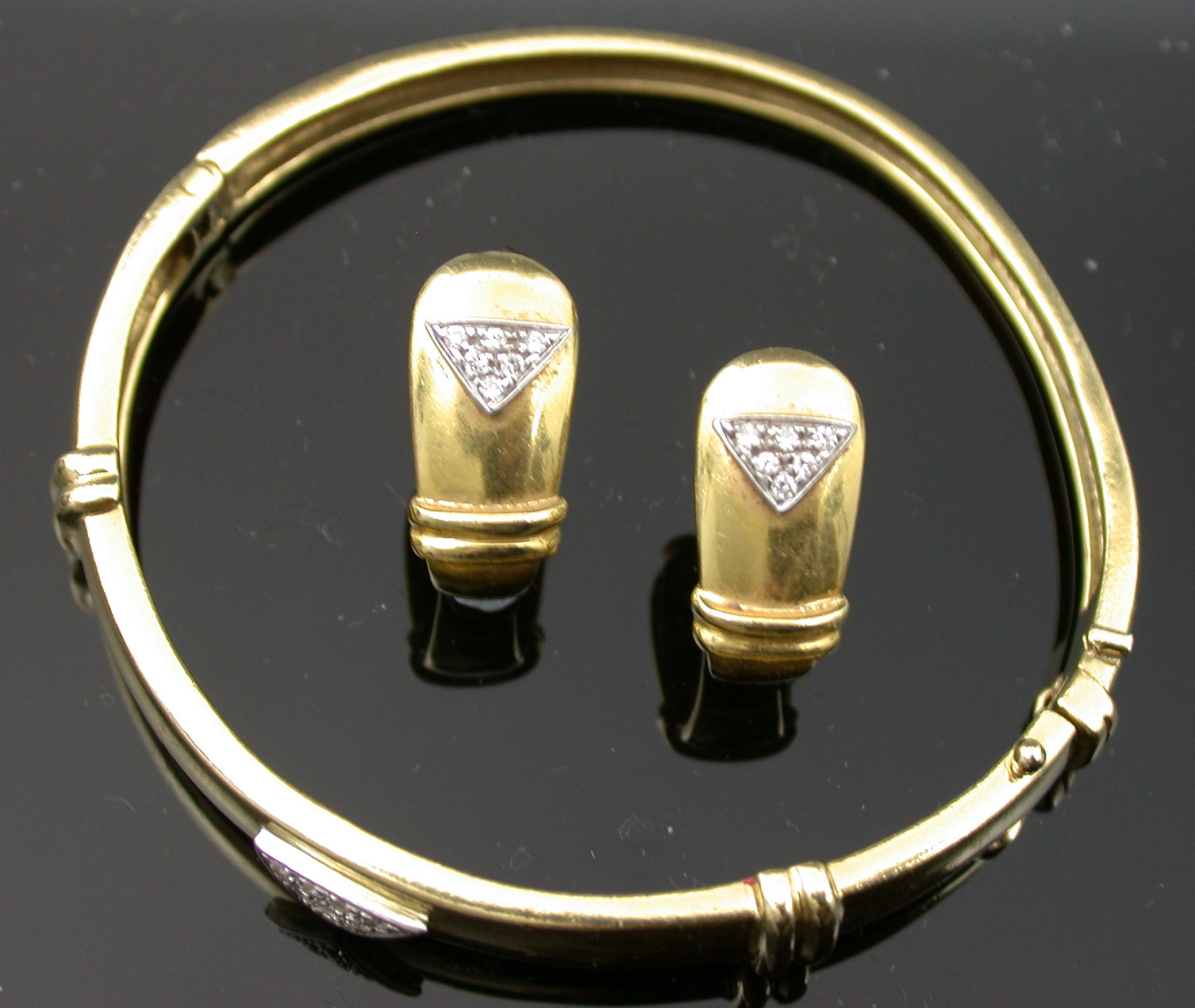 An Italian gold and diamond set suite,