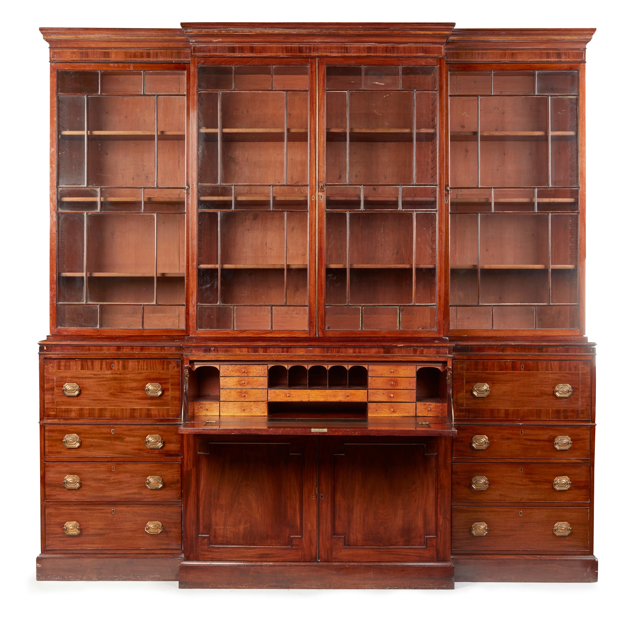 LATE GEORGE III MAHOGANY BREAKFRONT SECRETAIRE BOOKCASE