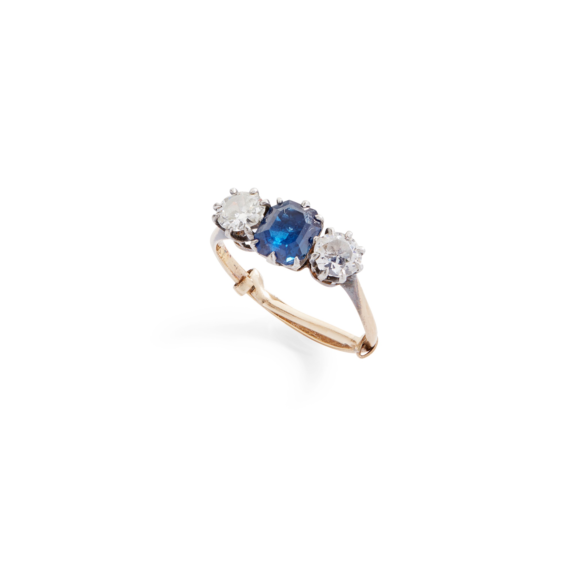 A sapphire and diamond three-stone ring