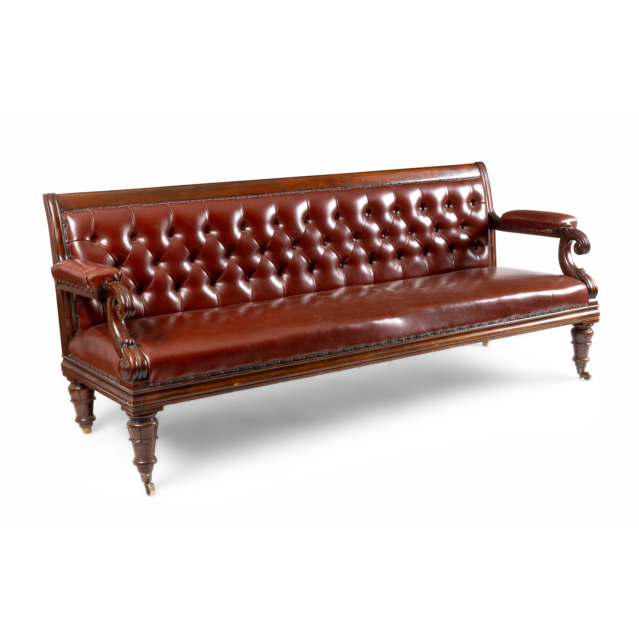 A PAIR OF EARLY VICTORIAN MAHOGANY LEATHER UPHOLSTERED SETTEES