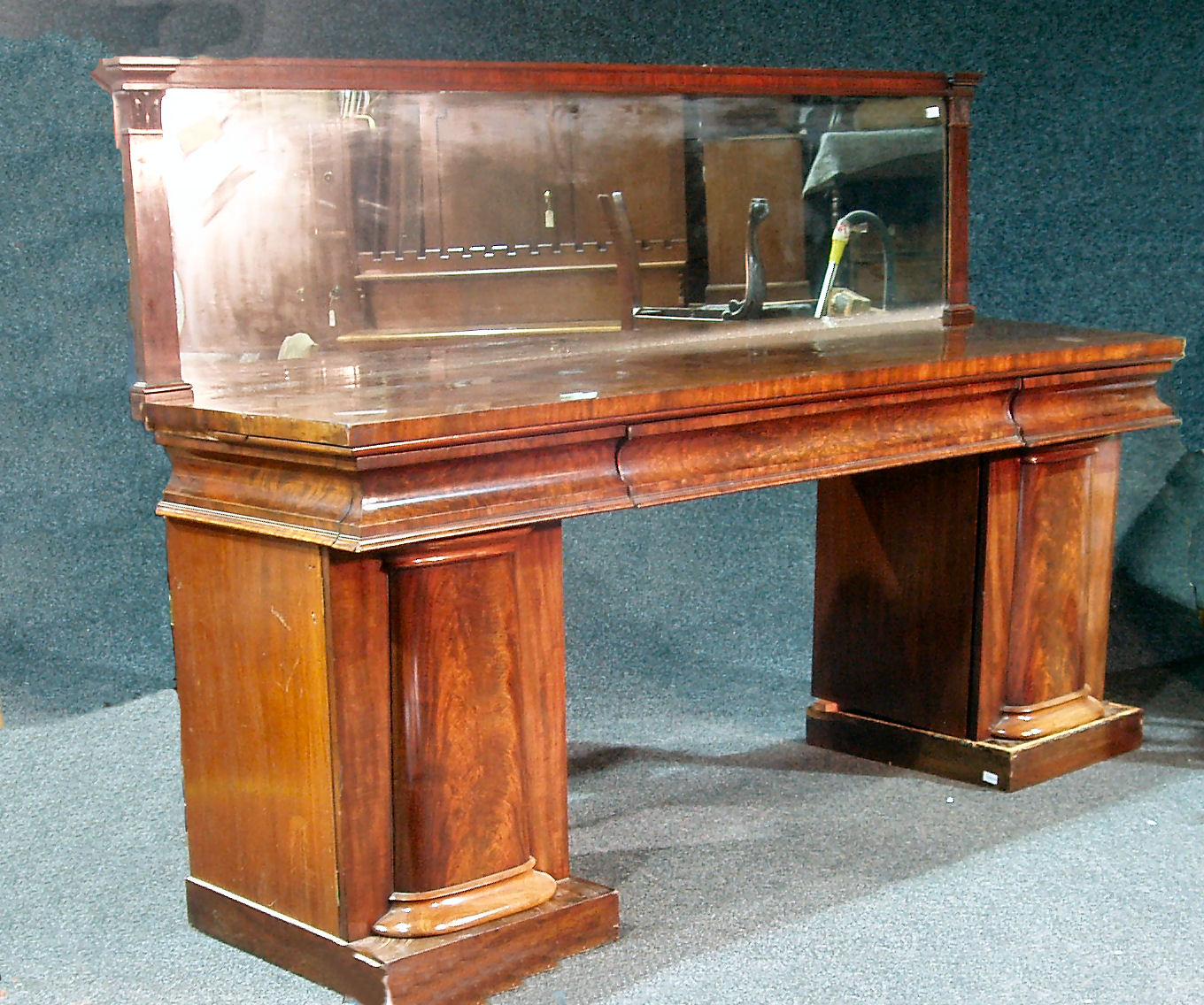 A Regency mahogany mirror back sideboard