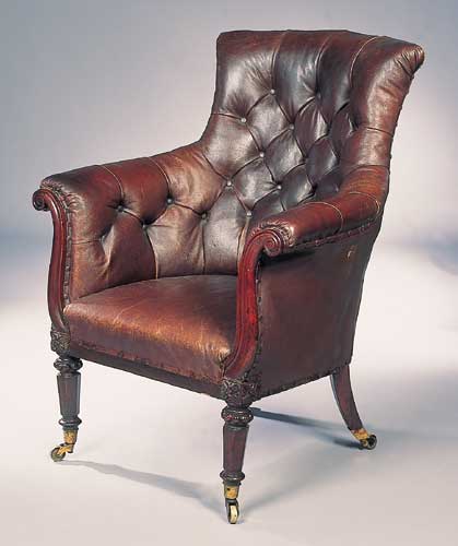 A late Regency mahogany framed leather armchair