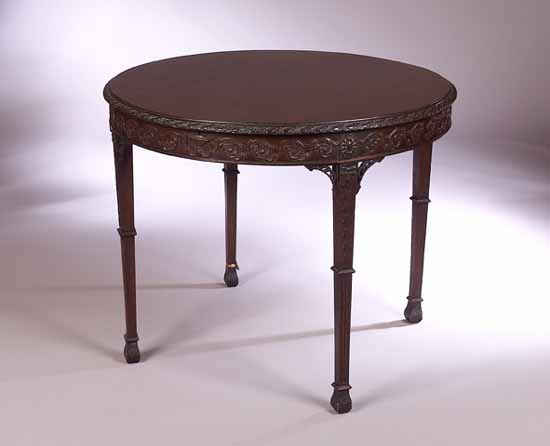 An Adam style circular mahogany occasional table