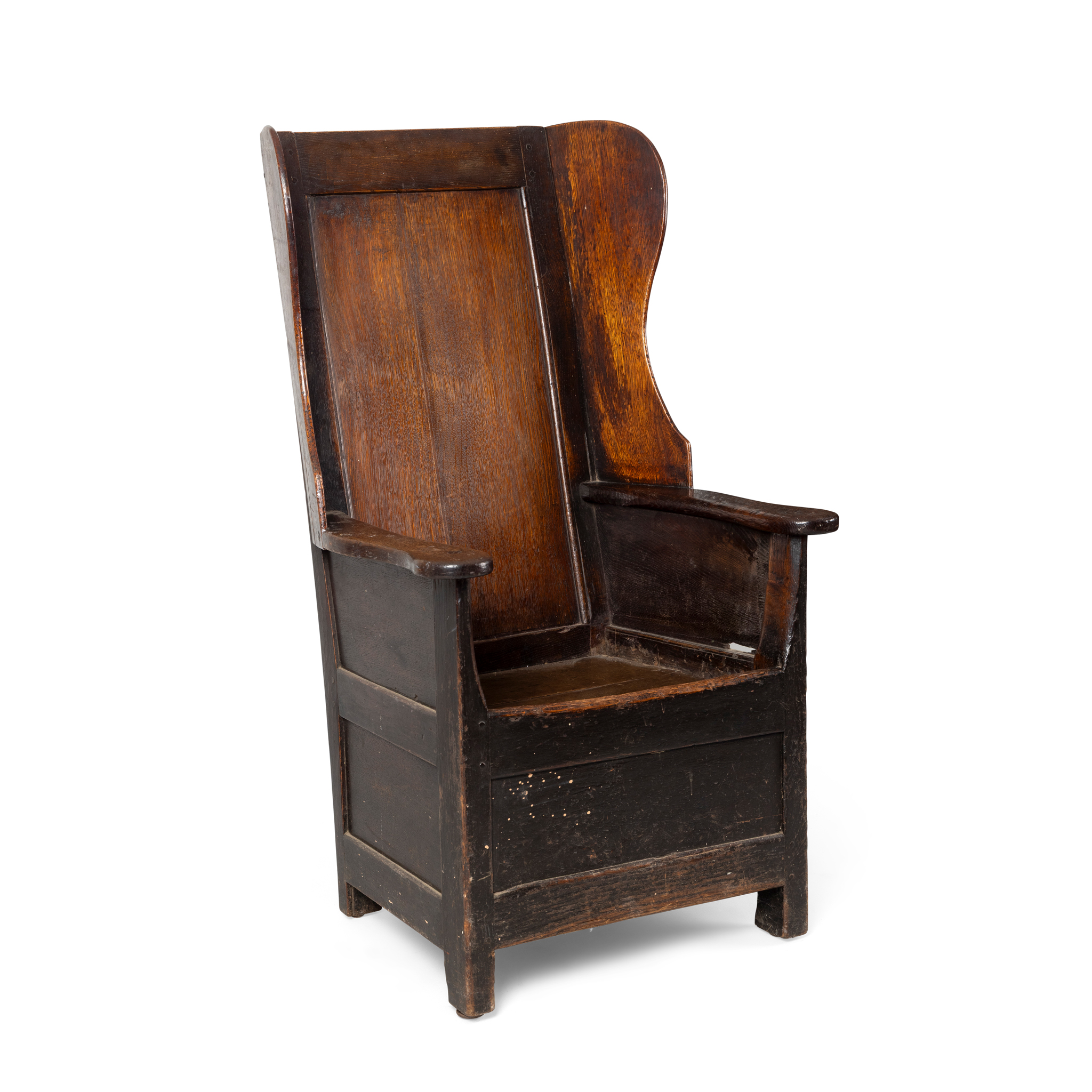 A GEORGE III OAK WINGBACK ARMCHAIR