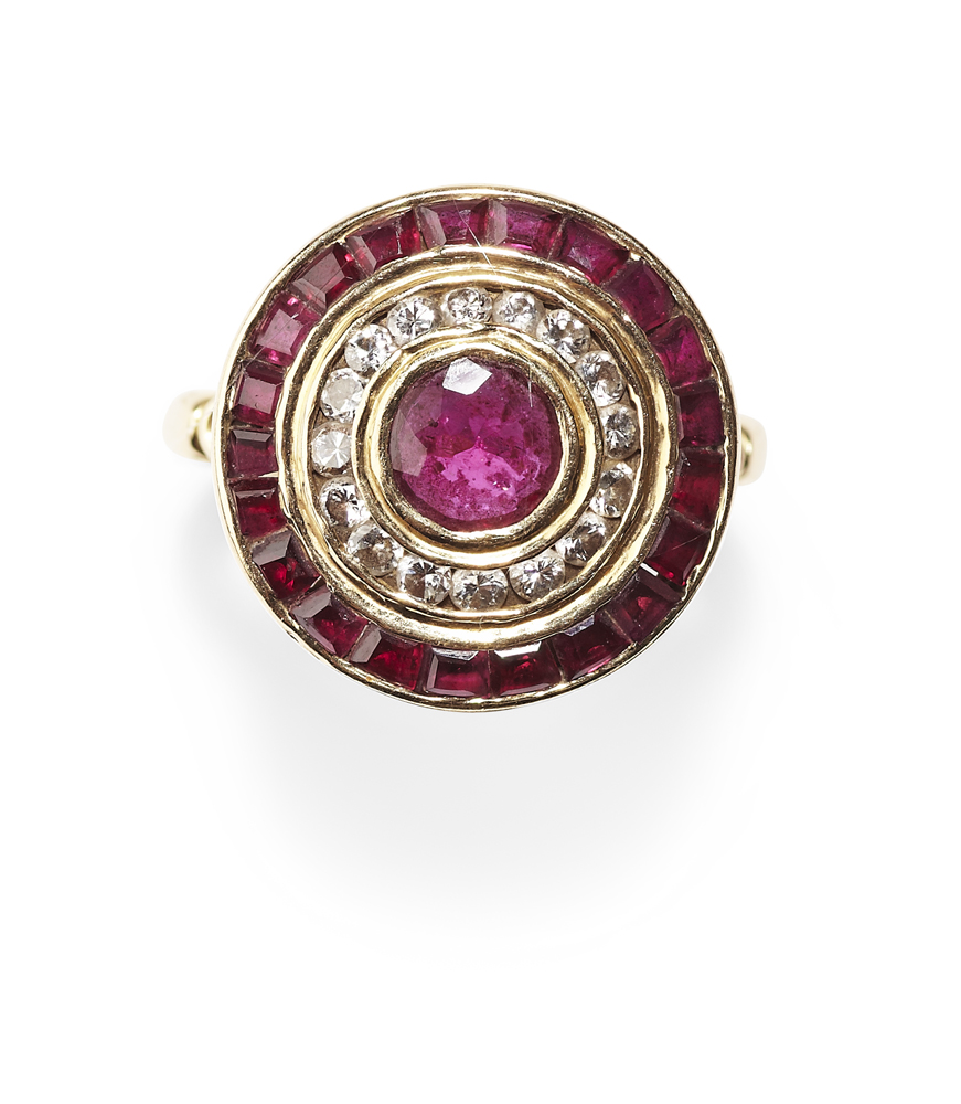 An 18ct gold mounted ruby and diamond cluster ring,