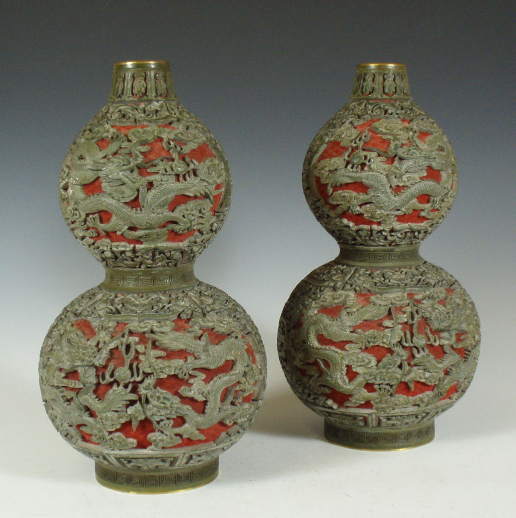 A pair of Chinese carved resin and lacquer double gourd vases