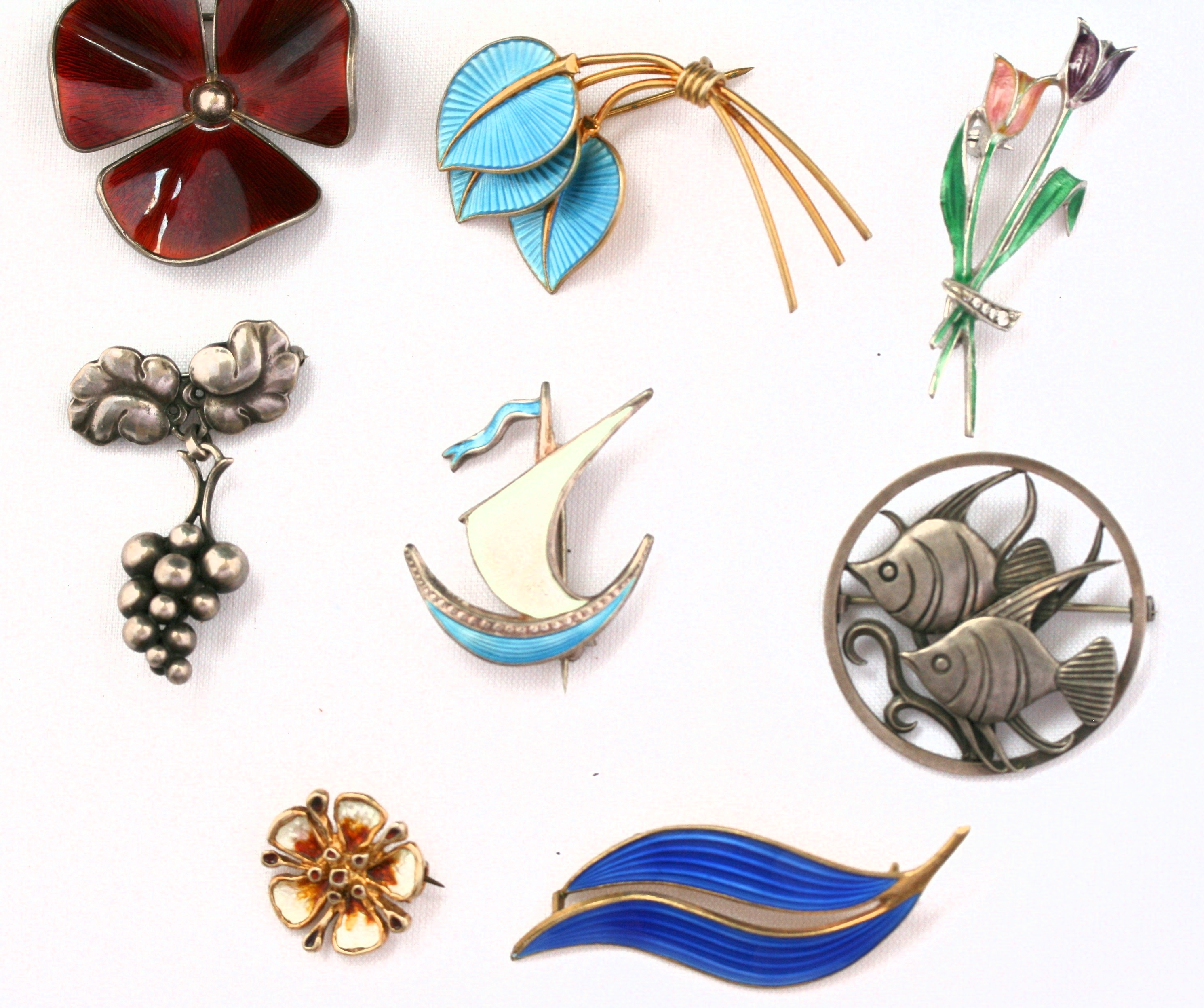 A collection of mid 20th century silver, enamelled and other jewellery to include;
