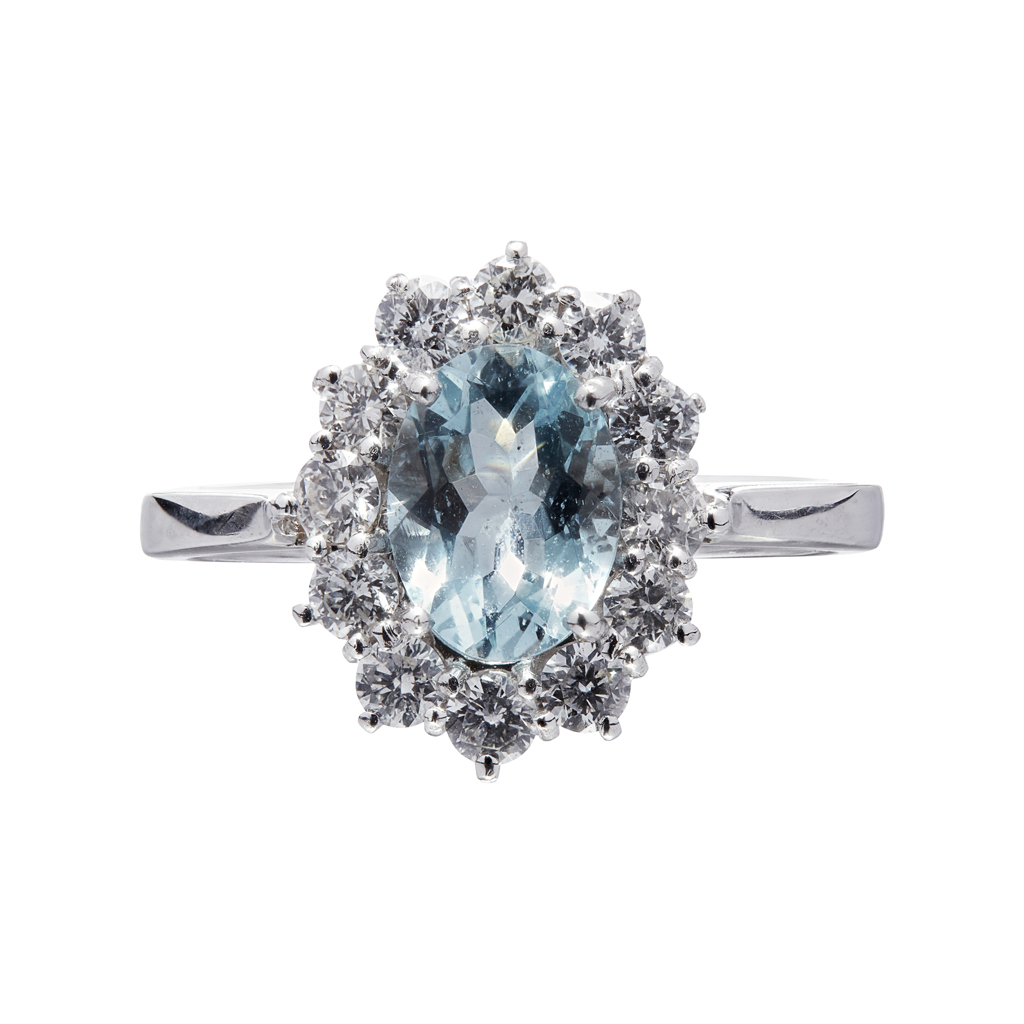 An aquamarine and diamond set cluster ring